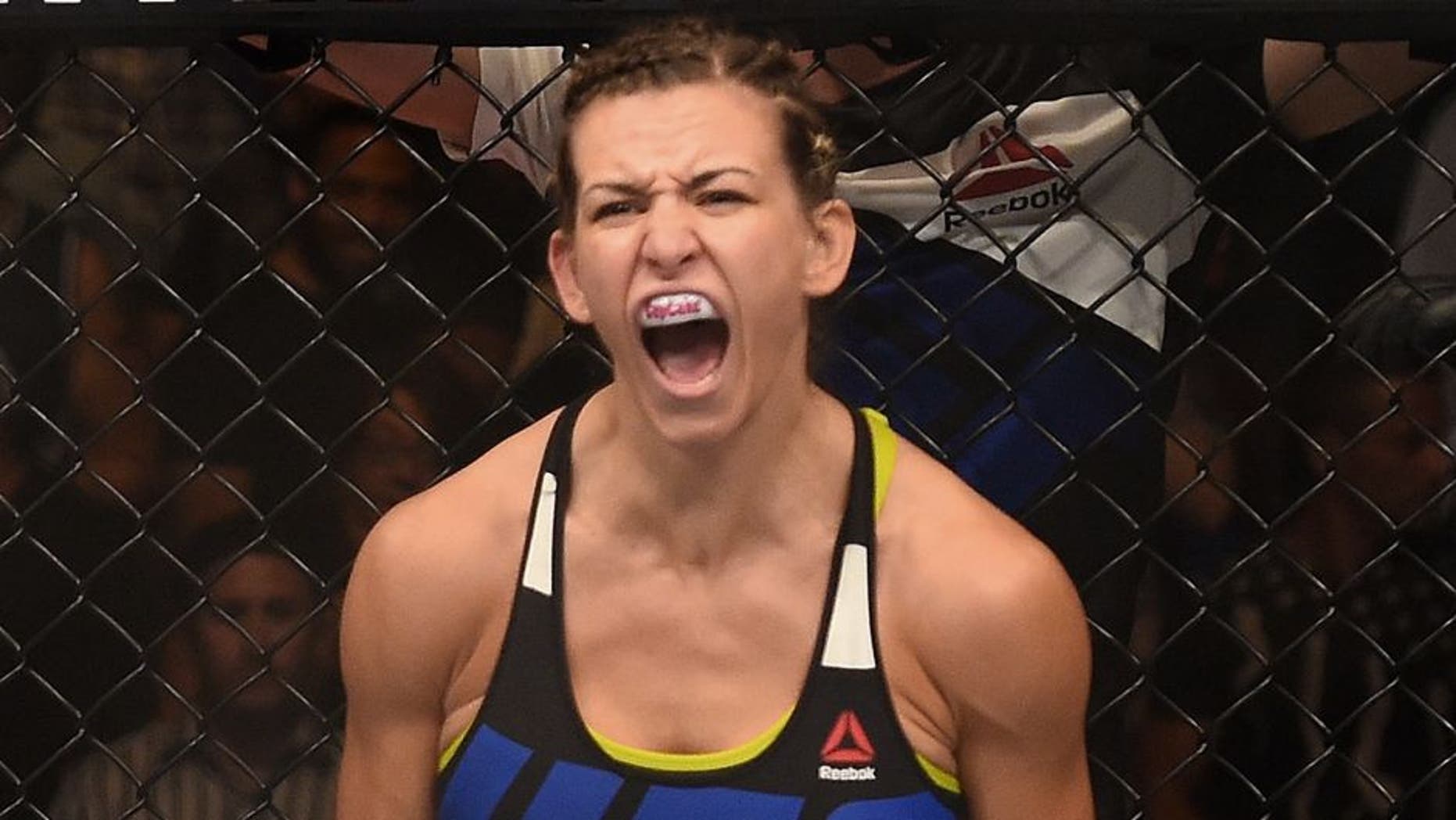 CHICAGO, IL - JULY 25: Miesha Tate stands in the Octagon before her women's bantamweight bout during the UFC event at the United Center on July 25, 2015 in Chicago, Illinois. (Photo by Jeff Bottari/Zuffa LLC/Zuffa LLC via Getty Images)