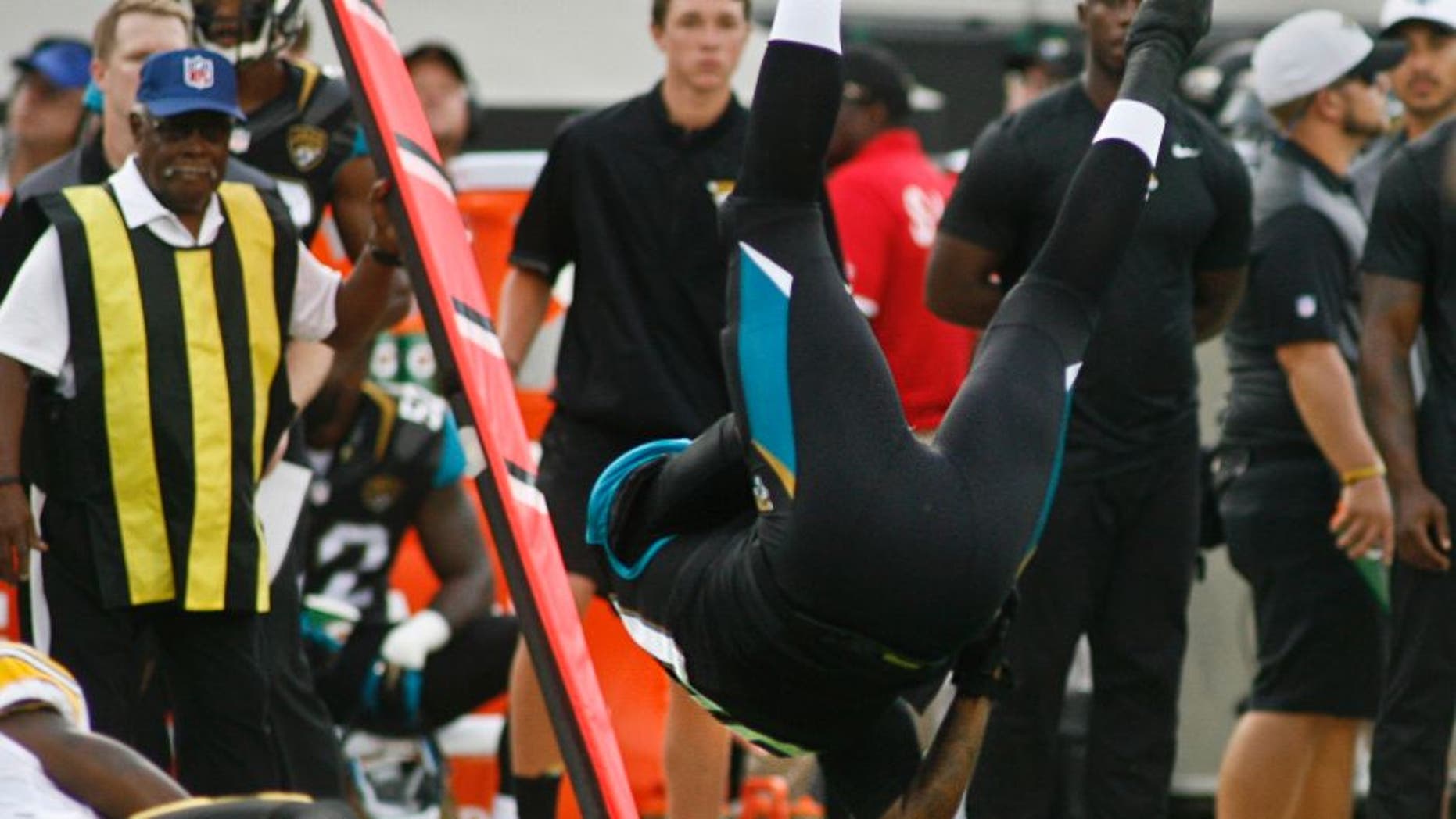 Aug 14, 2015; Jacksonville, FL, USA; Jacksonville Jaguars tight end Julius Thomas (80) flips after catching a pass in the first quarter of a preseason NFL football game against the Jacksonville Jaguars at EverBank Field. Thomas left the game with a hand injury after the play. Mandatory Credit: Phil Sears-USA TODAY Sports