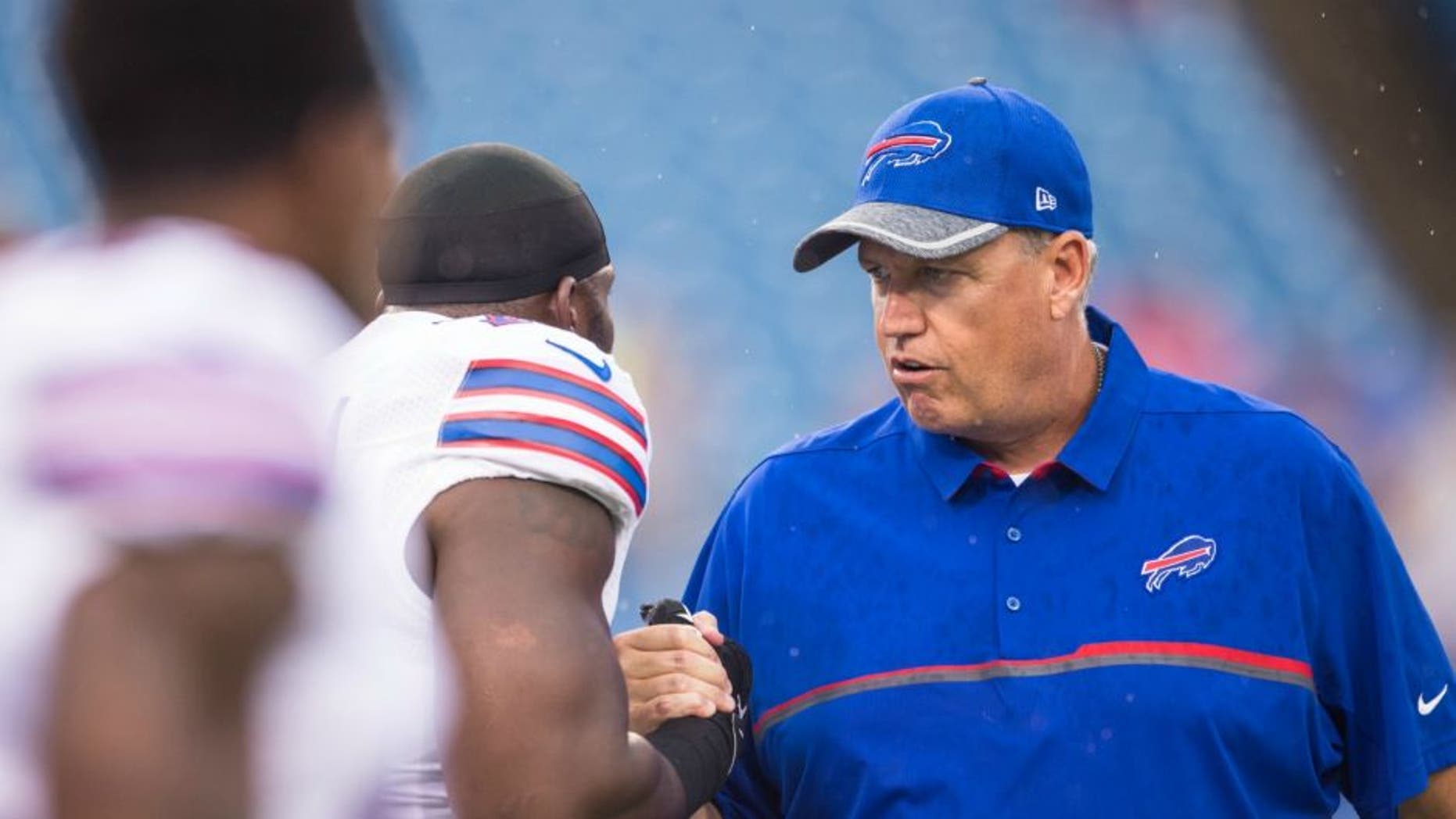 ORCHARD PARK, NY - AUGUST 13: Head coach Rex Ryan of the Buffalo Bills shakes the hands of players before the game against the Indianapolis Colts on August 13, 2016 at Ralph Wilson Stadium in Orchard Park, New York. (Photo by Brett Carlsen/Getty Images) *** Local Caption *** Rex Ryan
