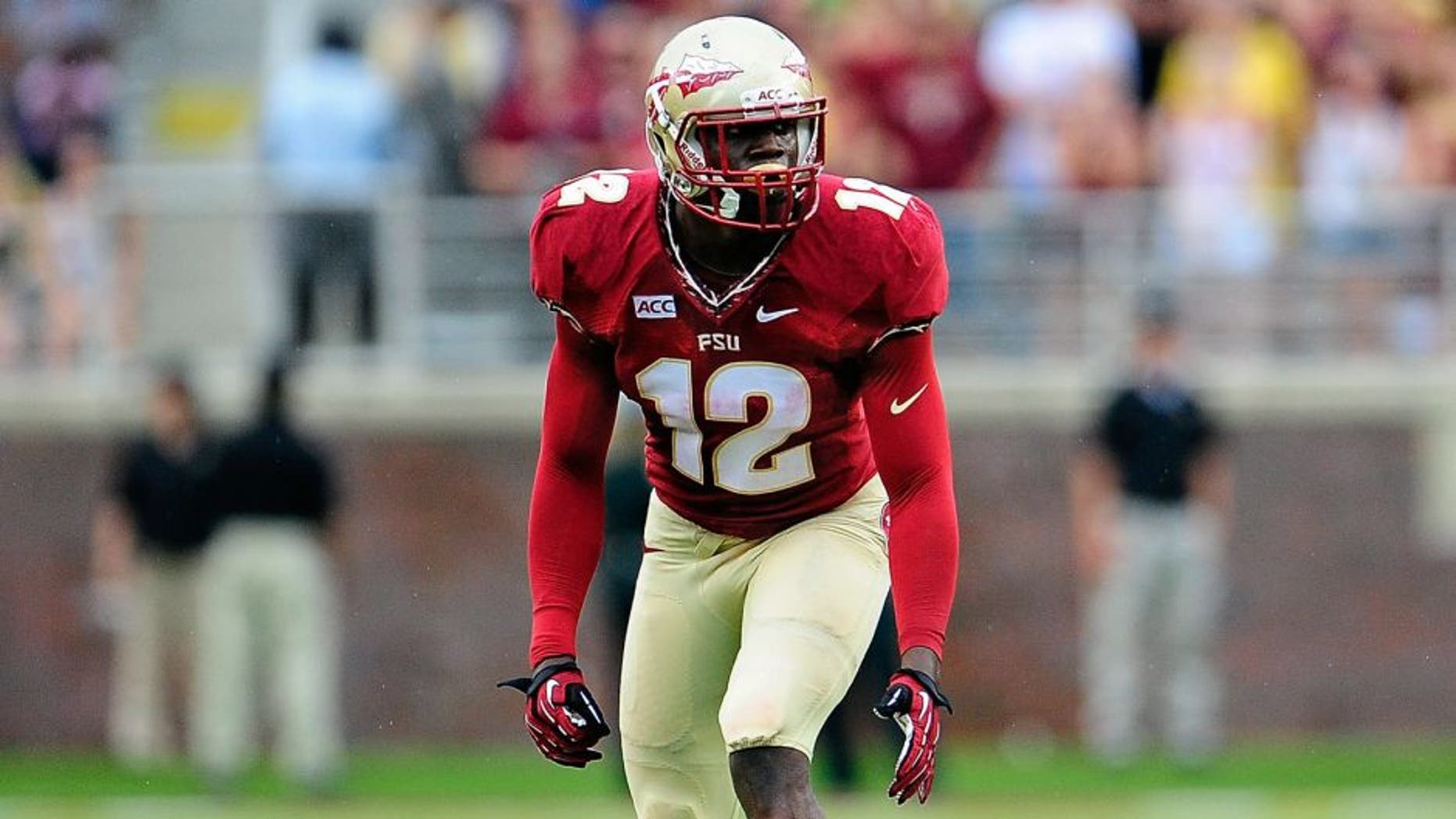 TALLAHASSEE, FL - SEPTEMBER 21: Matthew Thomas #12 of the Florida State Seminoles prepares for a play against the Bethune-Cookman Wildcats during a game at Doak Campbell Stadium on September 21, 2013 in Tallahassee, Florida. Florida State won the game 54-6. (Photo by Stacy Revere/Getty Images)