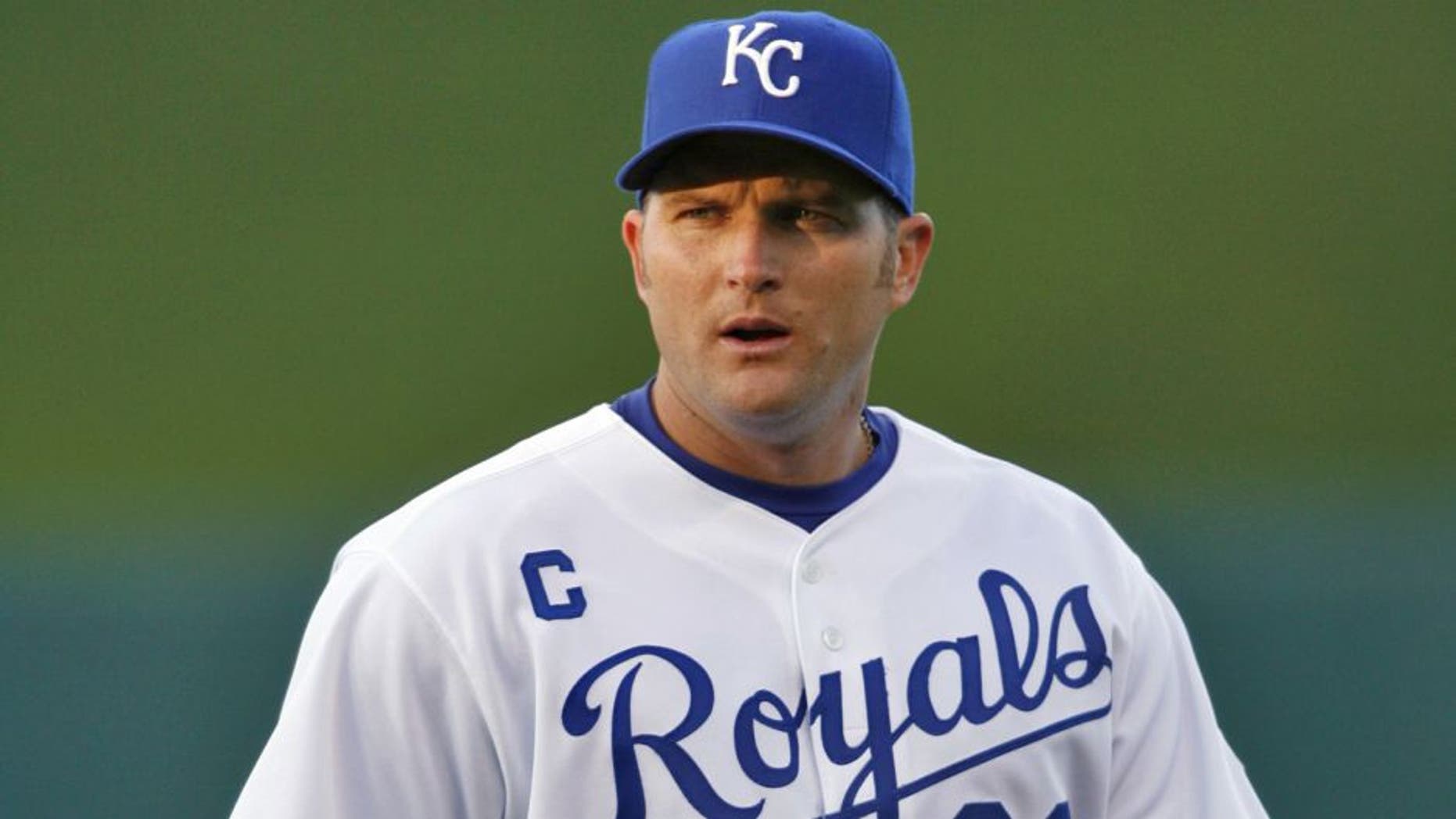 KANSAS CITY, MO - APRIL 4: Mike Sweeney #29 of the Kansas City Royals walks on the field during the game against the Boston Red Sox on April 4, 2007 at Kauffman Stadium in Kansas City, Missouri. Boston won 7-1. (Photo by G. Newman Lowrance/Getty Images)