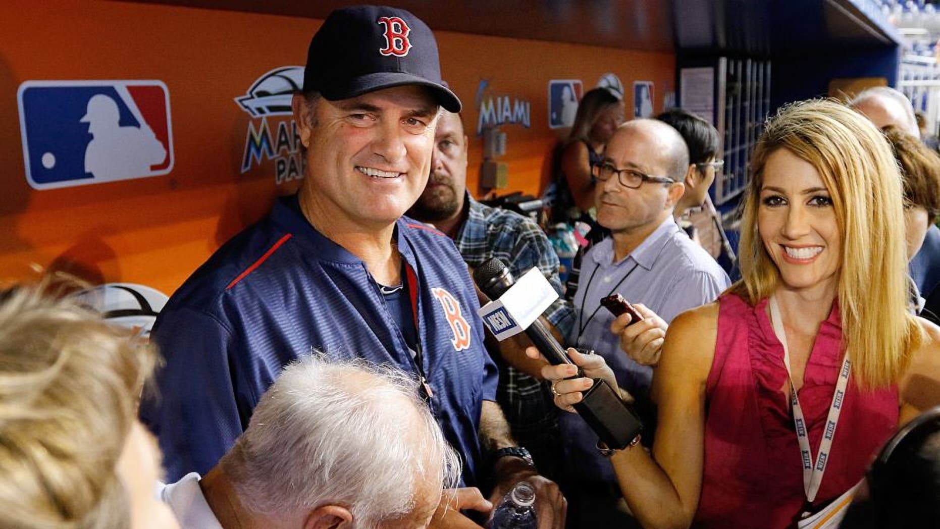 MIAMI, FL - AUGUST 11: Manager John Farrell #53 of the Boston Red Sox speaks with reporters before the Red Sox met the Miami Marlins at Marlins Park on August 11, 2015 in Miami, Florida. (Photo by Joe Skipper/Getty Images)