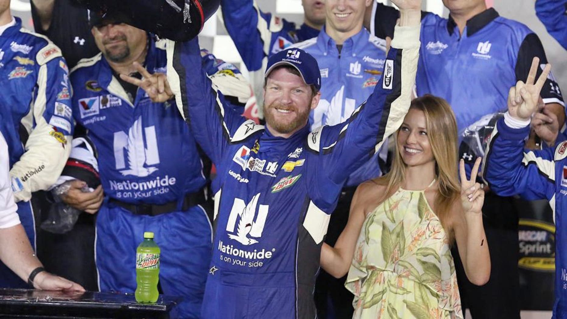 Dale Earnhardt Jr. celebrates in Victory Lane after winning the Coke Zero 400 NASCAR Sprint Cup race at Daytona International Speedway on Sunday, July 5, 2015 in Daytona Beach, Fla. (Stephen M. Dowell/Orlando Sentinel/TNS via Getty Images)