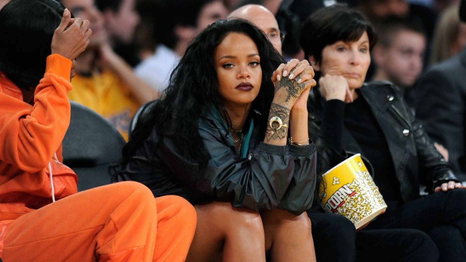LOS ANGELES, CA - JANUARY 15: Singer, Rihanna attends the Cleveland Cavaliers game against the Los Angeles Lakers on January 15, 2015 at Staples Center in Los Angeles, California. NOTE TO USER: User expressly acknowledges and agrees that, by downloading and or using this Photograph, user is consenting to the terms and conditions of the Getty Images License Agreement. Mandatory Copyright Notice: Copyright 2015 NBAE (Photo by Juan Ocampo/NBAE via Getty Images)
