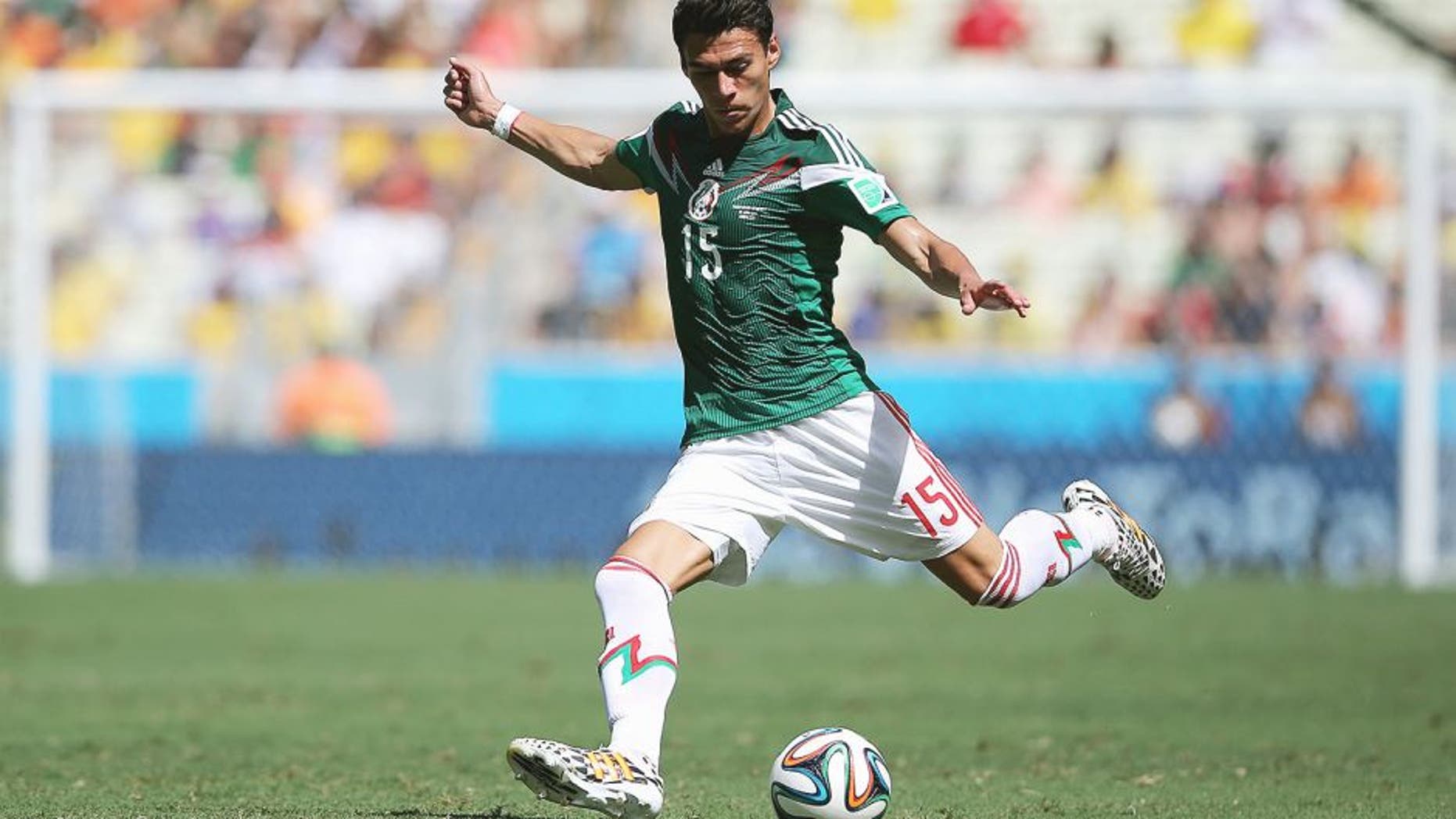 FORTALEZA, BRAZIL - JUNE 29: Hector Moreno of Mexico in action during the 2014 FIFA World Cup Brazil Round of 16 match between Netherlands and Mexico at Castelao on June 29, 2014 in Fortaleza, Brazil. (Photo by Dean Mouhtaropoulos/Getty Images)