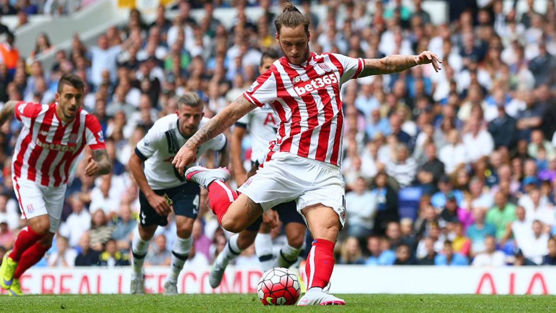 LONDON, ENGLAND - AUGUST 15: Marko Arnautovic of Stoke City scores his team's first goal from the penalty spot during the Barclays Premier League match between Tottenham Hotspur and Stoke City at White Hart Lane on August 15, 2015 in London, United Kingdom. (Photo by Dan Mullan/Getty Images)