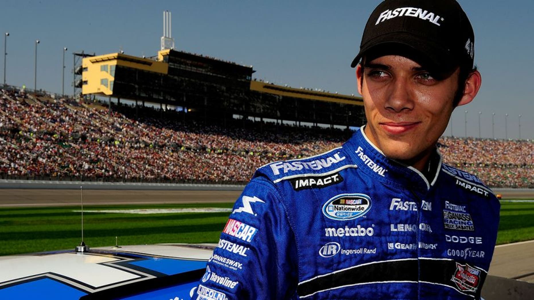 KANSAS CITY, KS - SEPTEMBER 27: Brian Clauson, driver of the #40 Fastenal Dodge prepares to drive prior to the start of the NASCAR Nationwide Series Kansas Lottery 300 at Kansas Speedway on September 27, 2008 in Kansas City, Kansas. (Photo by Rusty Jarrett/Getty Images for NASCAR)