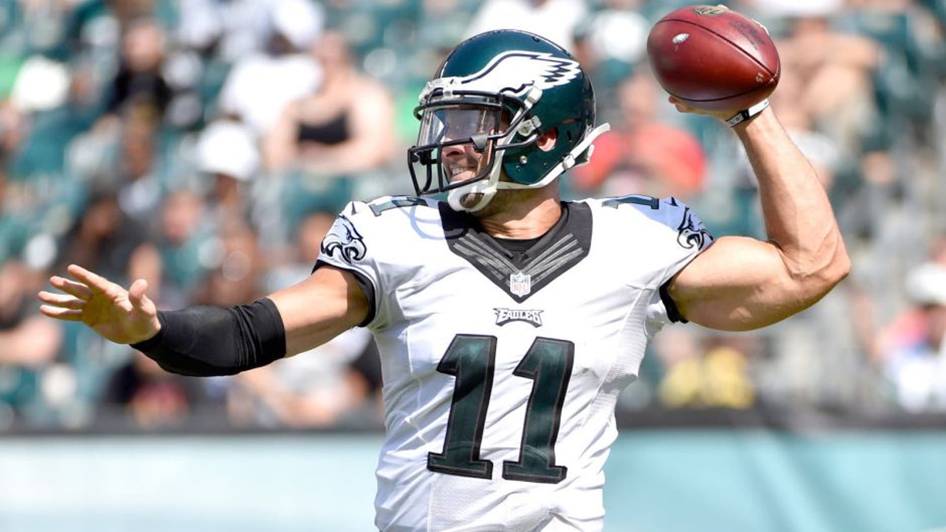 Aug 16, 2015; Philadelphia, PA, USA; Philadelphia Eagles quarterback Tim Tebow (11) throws the ball during the second half of a preseason NFL football game against the Indianapolis Colts at Lincoln Financial Field. Mandatory Credit: Derik Hamilton-USA TODAY Sports
