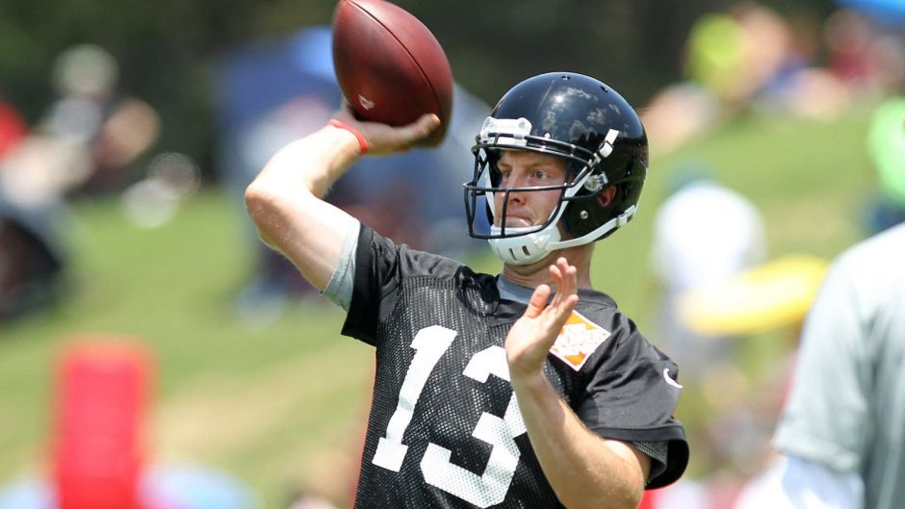 Jun 17, 2015; Atlanta, GA, USA; Atlanta Falcons quarterback T.J. Yates (13) throws a pass during minicamp at Falcons Training Facility. Mandatory Credit: Brett Davis-USA TODAY Sports