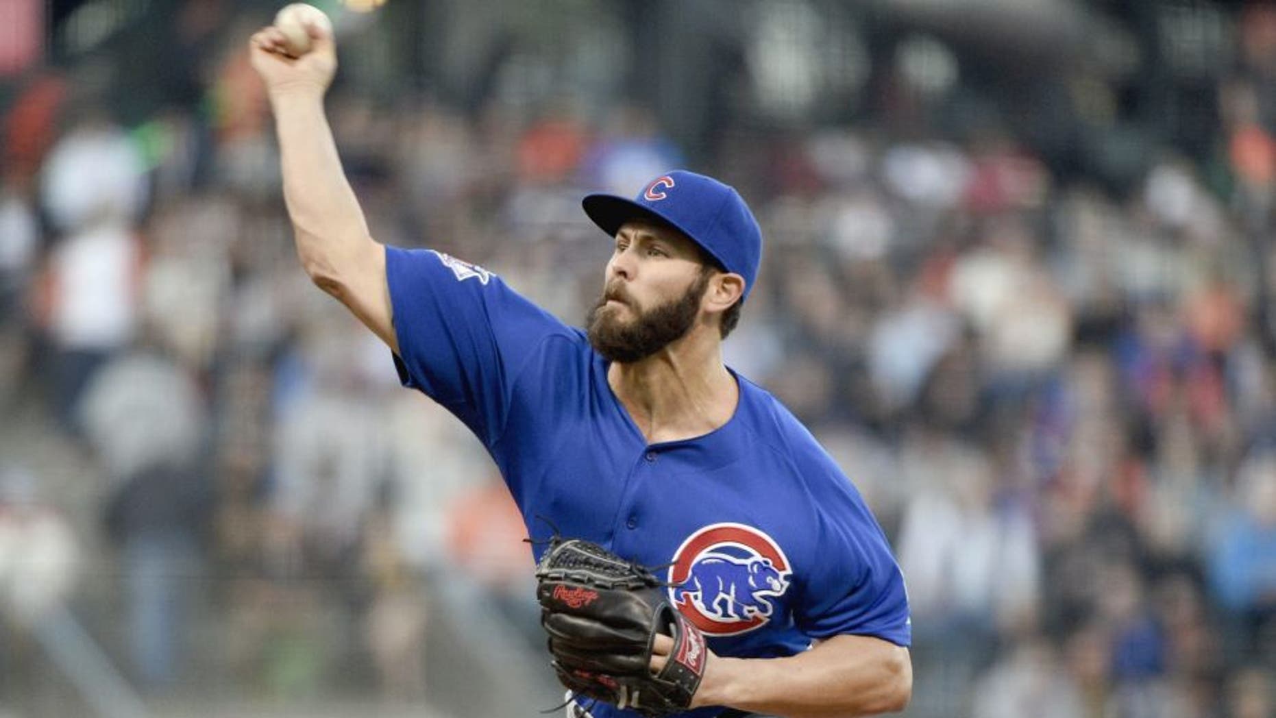 August 25, 2015; San Francisco, CA, USA; Chicago Cubs starting pitcher Jake Arrieta (49) delivers a pitch during the first inning against the San Francisco Giants at AT&T Park. Mandatory Credit: Kyle Terada-USA TODAY Sports