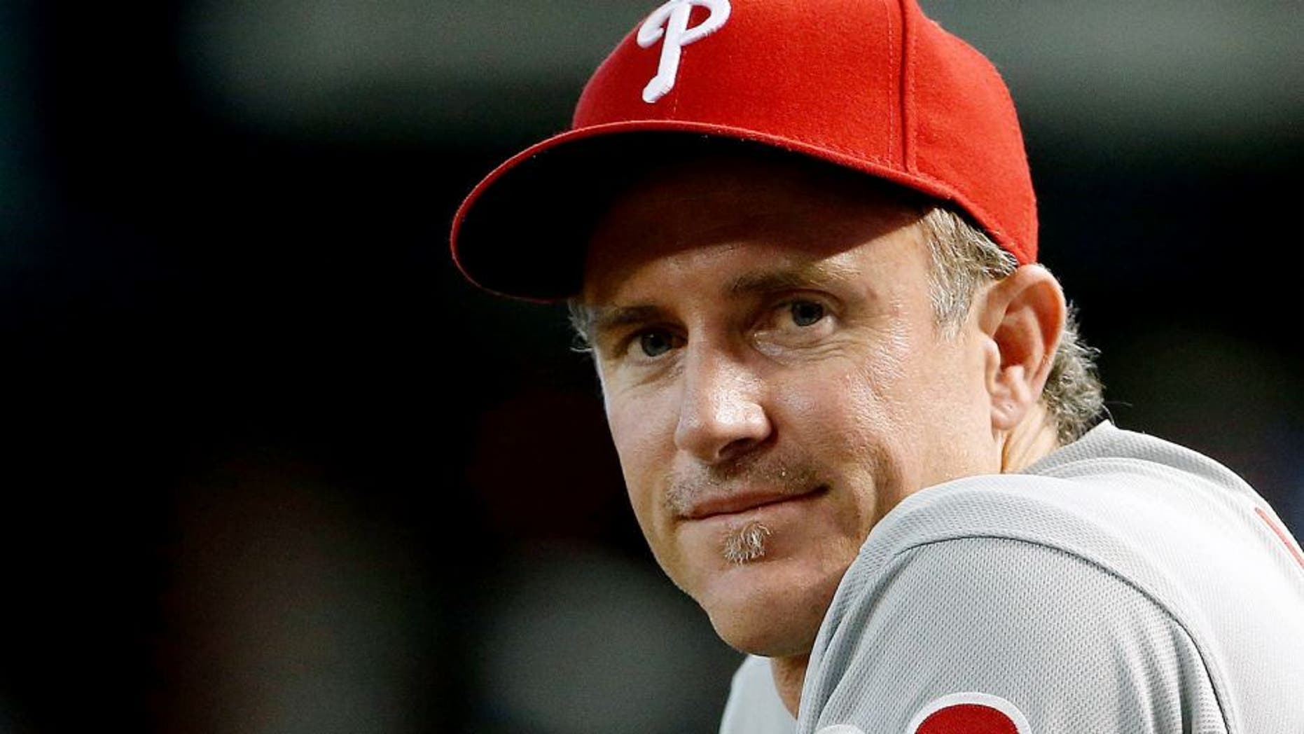 PHOENIX, AZ - AUGUST 12: Chase Utley #26 of the Philadelphia Phillies watches from the dugout during the MLB game against the Arizona Diamondbacks at Chase Field on August 12, 2015 in Phoenix, Arizona. The Phillies defeated the Diamondbacks 7-6. (Photo by Christian Petersen/Getty Images)