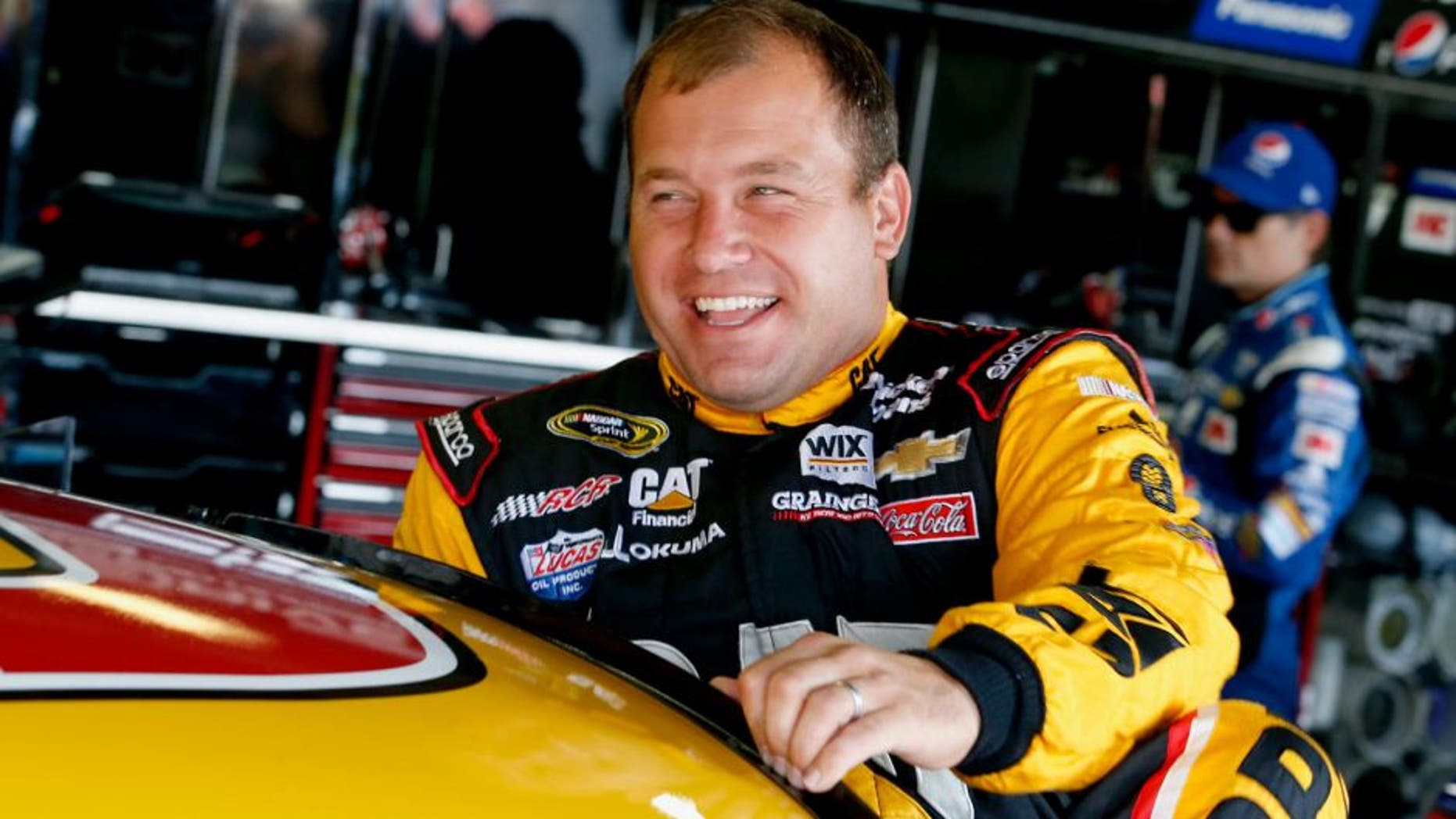 BROOKLYN, MI - AUGUST 15: Ryan Newman, driver of the #31 Caterpillar Chevrolet, climbs into his car during practice for the NASCAR Sprint Cup Series Pure Michigan 400 at Michigan International Speedway on August 15, 2015 in Brooklyn, Michigan. (Photo by Gregory Shamus/Getty Images)