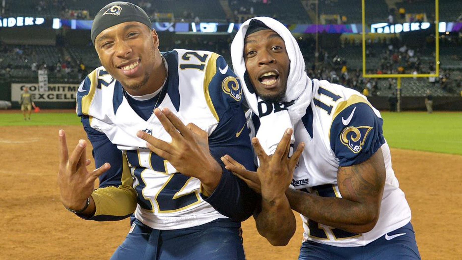 Aug 14, 2015; Oakland, CA, USA; St. Louis Rams receivers Stedman Bailey (12) and Tavon Austin (11) pose after the preseason NFL game against the Oakland Raiders at O.co Coliseum. Mandatory Credit: Kirby Lee-USA TODAY Sports
