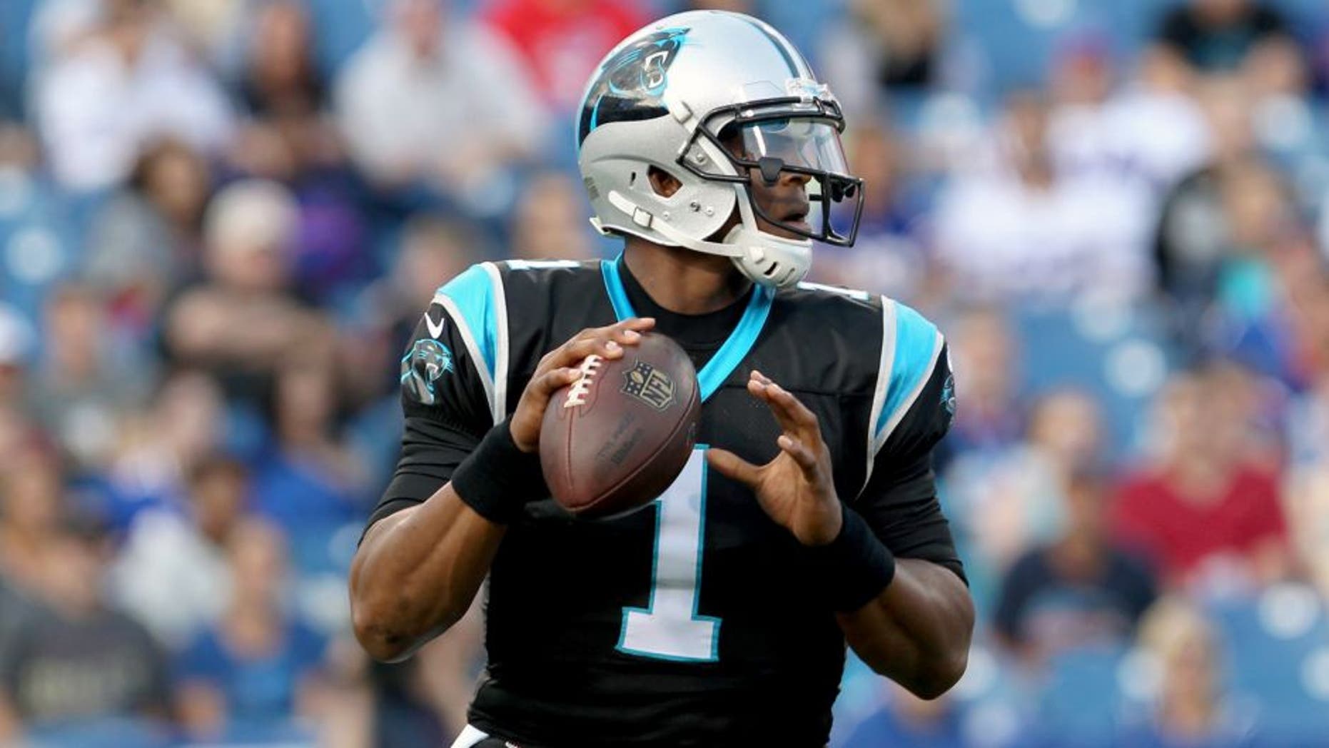 Aug 14, 2015; Orchard Park, NY, USA; Carolina Panthers quarterback Cam Newton (1) looks to make a pass attempt during the first quarter against the Buffalo Bills in a preseason NFL football game at Ralph Wilson Stadium. Mandatory Credit: Timothy T. Ludwig-USA TODAY Sports