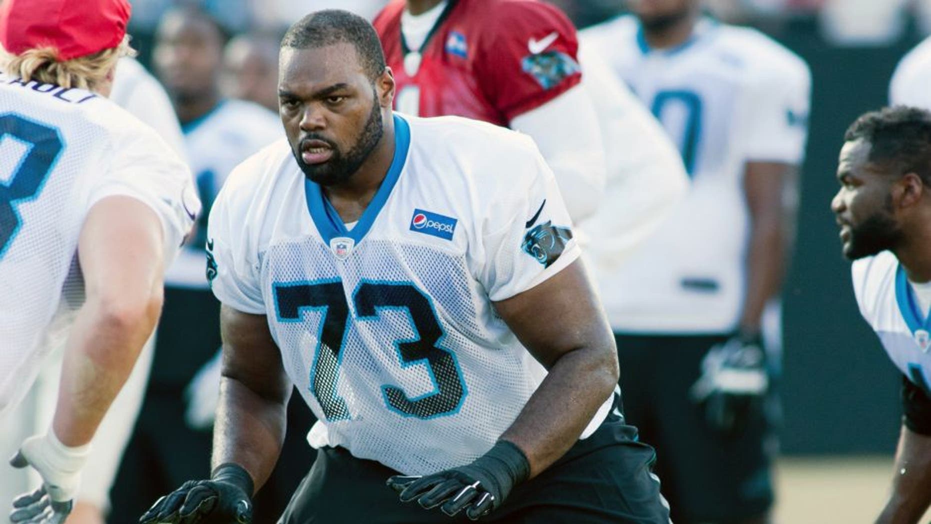 Jul 31, 2015; Spartanburg, SC, USA; Carolina Panthers tackle Michael Oher (73) looks to block during a drill in training camp held at Wofford College. Mandatory Credit: Jeremy Brevard-USA TODAY Sports