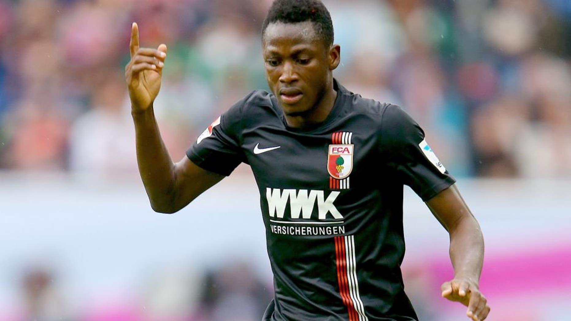 MOENCHENGLADBACH, GERMANY - JULY 12: Abdul Rahman Baba of Augsburg runs with the ball during the Telekom Cup 2015 Semi Final match between Borussia Moenchegladbach and Hamburger SV at Borussia-Park on July 12, 2015 in Moenchengladbach, Germany. (Photo by Christof Koepsel/Bongarts/Getty Images)