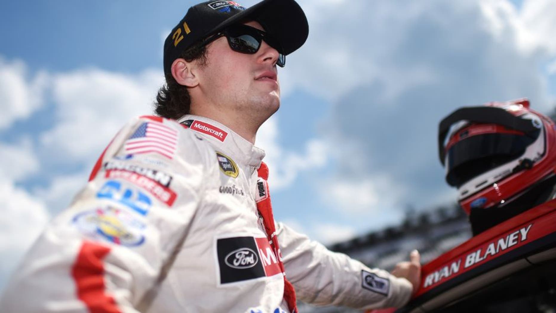 LONG POND, PA - JULY 29: Ryan Blaney, driver of the #21 Motorcraft/Quick Lane Tire & Auto Center Ford stands on the grid during qualifying for the NASCAR Sprint Cup Series Pennsylvania 400 at Pocono Raceway on July 29, 2016 in Long Pond, Pennsylvania. (Photo by Rainier Ehrhardt/NASCAR via Getty Images)