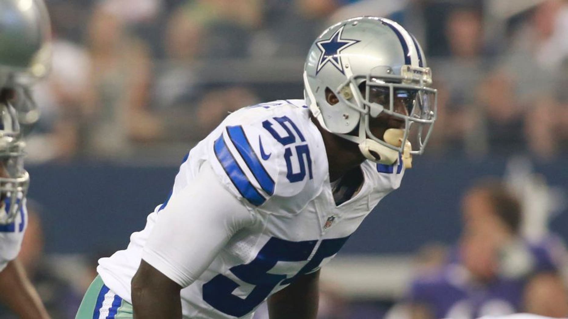 Aug 16, 2014; Arlington, TX, USA; Dallas Cowboys linebacker Rolando McClain (55) in game action against the Baltimore Ravens at AT&T Stadium. Baltimore beat Dallas 37-30. Mandatory Credit: Tim Heitman-USA TODAY Sports