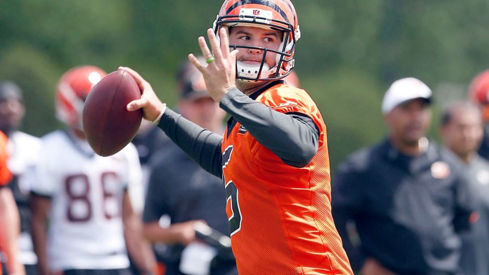 May 26, 2015; Cincinnati, OH, USA; Cincinnati Bengals quarterback AJ McCarron (5) looks to pass during OTAs at Paul Brown Stadium. Mandatory Credit: Aaron Doster-USA TODAY Sports