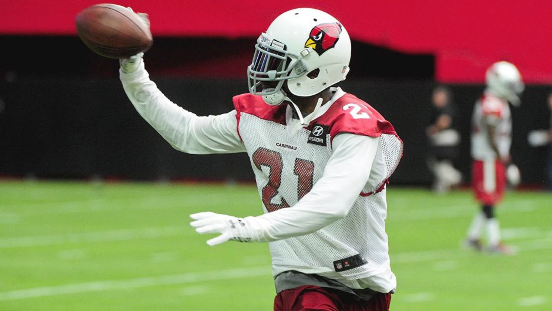 Aug 1, 2015; Glendale, AZ, USA; Arizona Cardinals cornerback Patrick Peterson (21) makes a one handed catch during training camp at University of Phoenix. Mandatory Credit: Matt Kartozian-USA TODAY Sports