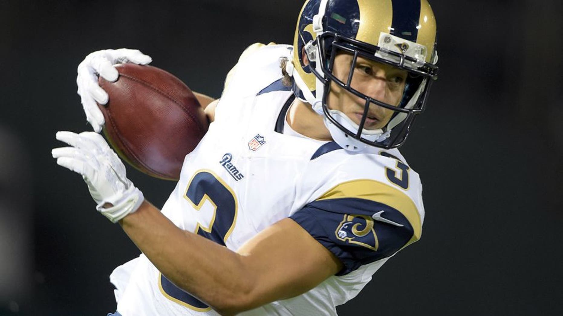 Aug 14, 2015; Oakland, CA, USA; St. Louis Rams receiver Daniel Rodriguez (3) returns a kickoff against the Oakland Raiders in a preseason NFL football game at O.co Coliseum. Mandatory Credit: Kirby Lee-USA TODAY Sports