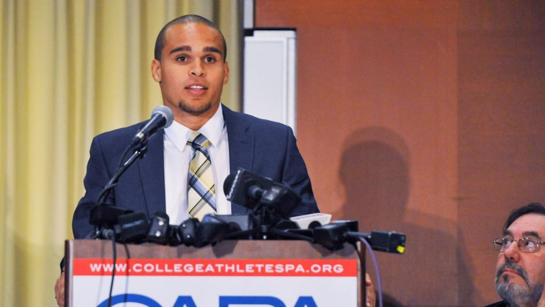 Northwestern quarterback Kain Colter speaks at a press conference on January 28 2014 at The Hyatt Regency Hotel in Chicago Illinois. Citing what they deem as the NCAA's abdication of responsibility to protect athletes from injury, the College Athletes Association (CAPA) announced the creation of the new labor organization to represent college football and basketball players. (Photo by David Banks/Getty Images)