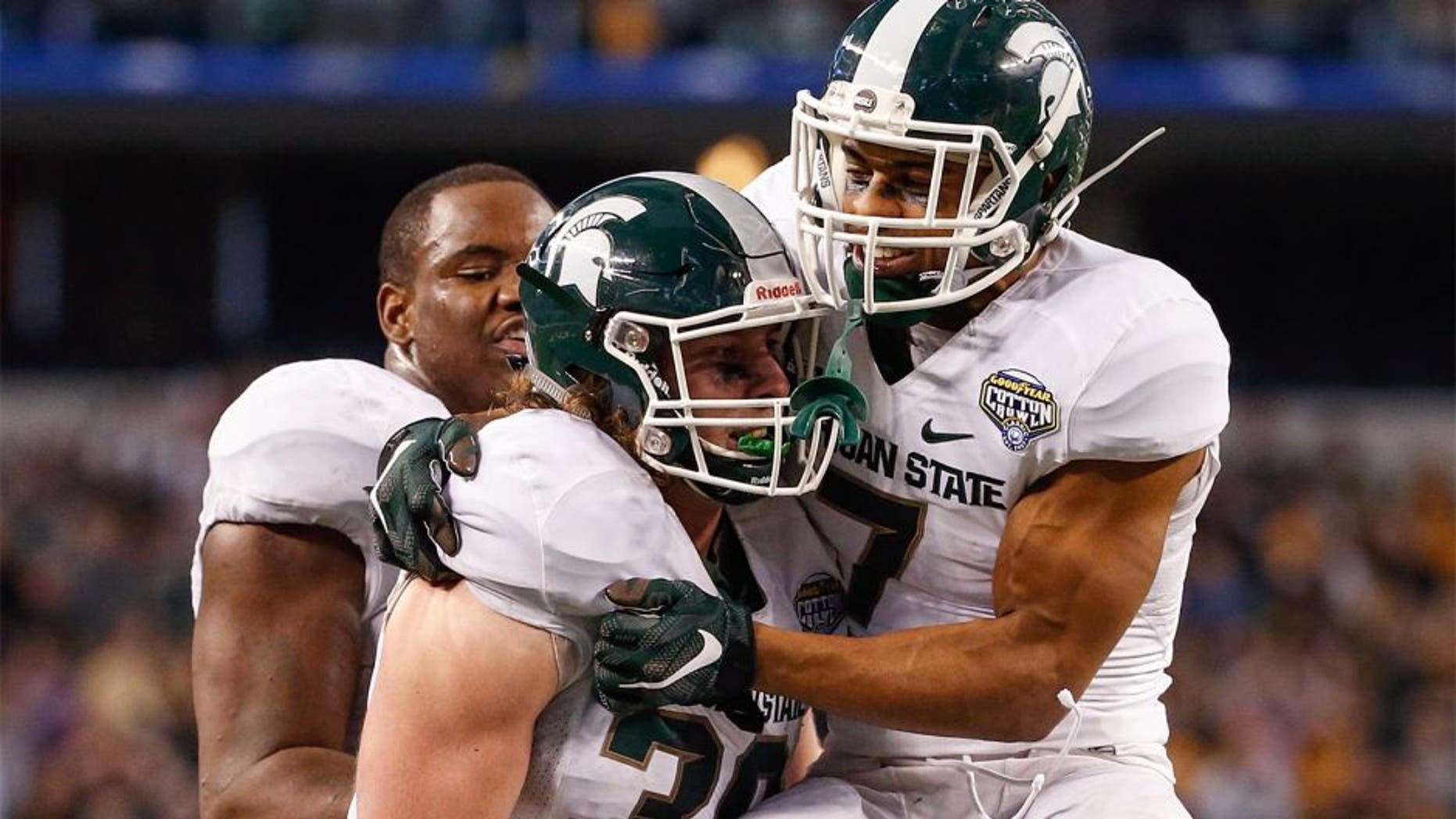 Jan 1, 2015; Arlington, TX, USA; Baylor Bears wide receiver Tanner Ritchey (30) celebrates with safety Demetrious Cox (7) after making an interception during the fourth quarter against the Baylor Bears in the 2015 Cotton Bowl Classic at AT&T Stadium. Mandatory Credit: Kevin Jairaj-USA TODAY Sports