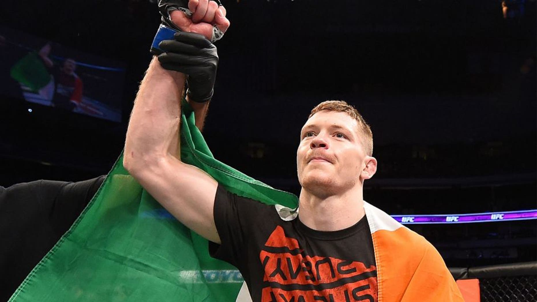 DALLAS, TX - MARCH 14: Joseph Duffy celebrates after defeating Jake Lindsey in their lightweight bout during the UFC 185 event at the American Airlines Center on March 14, 2015 in Dallas, Texas. (Photo by Josh Hedges/Zuffa LLC/Zuffa LLC via Getty Images)