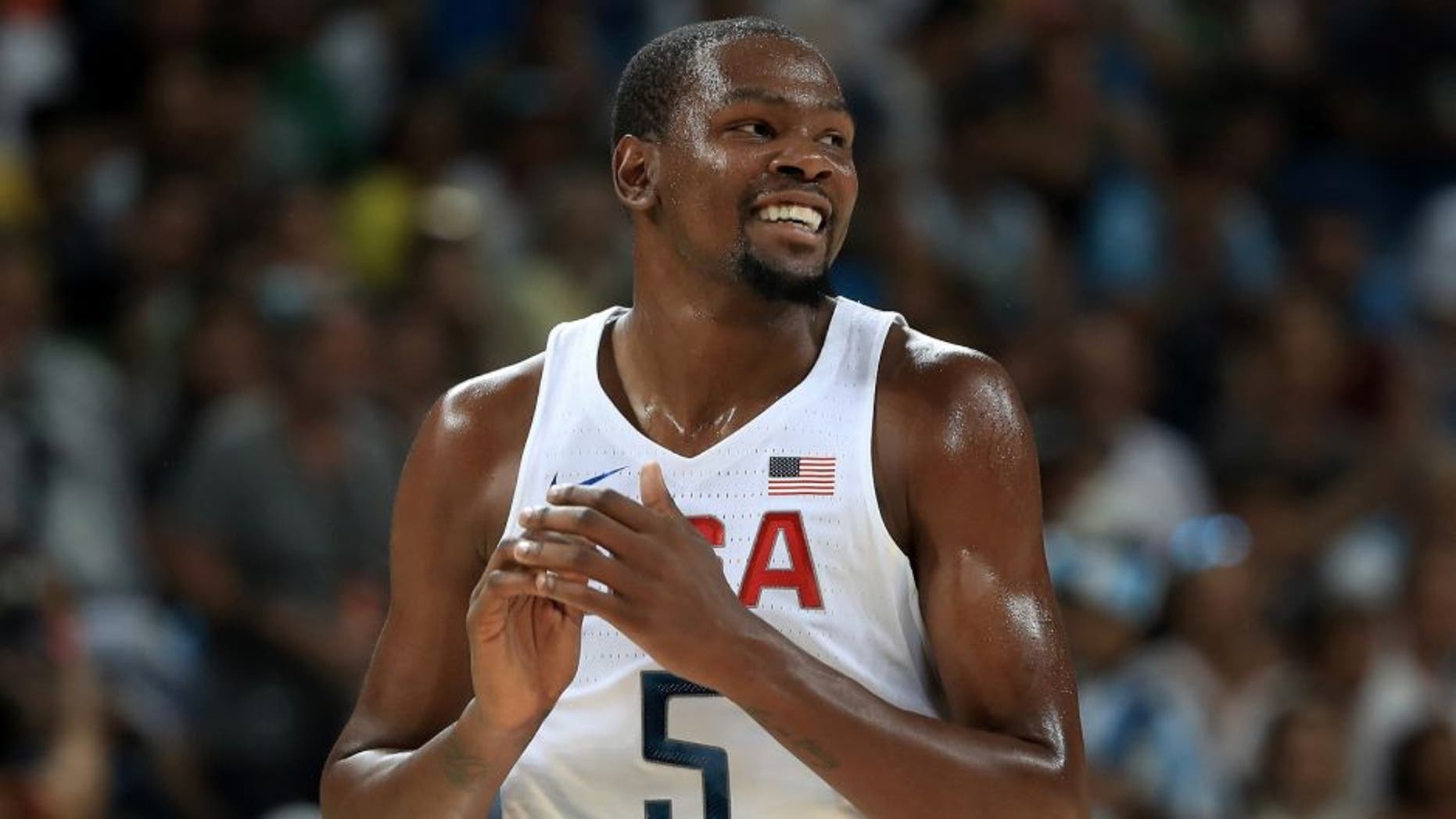 RIO DE JANEIRO, BRAZIL - AUGUST 17: Kevin Durant #5 of United States reacts in the first half while taking on Argentina during the Men's Quarterfinal match on Day 12 of the Rio 2016 Olympic Games at Carioca Arena 1 on August 17, 2016 in Rio de Janeiro, Brazil. (Photo by Sam Greenwood/Getty Images)