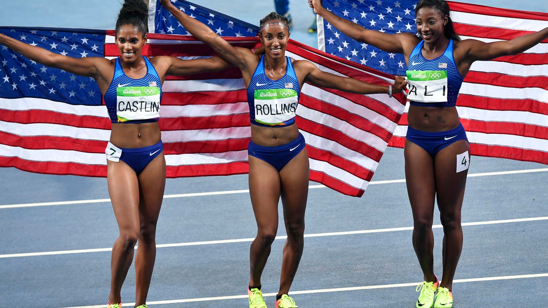 Aug. 17, 2016: Gold medal winner United States' Brianna Rollins, center, silver medal winner United States' Nia Ali, right, and bronze medal winner United States' Kristi Castlin celebrate after the women's 100-meter hurdles final during the athletics competitions of the 2016 Summer Olympics at the Olympic stadium in Rio de Janeiro, Brazil.