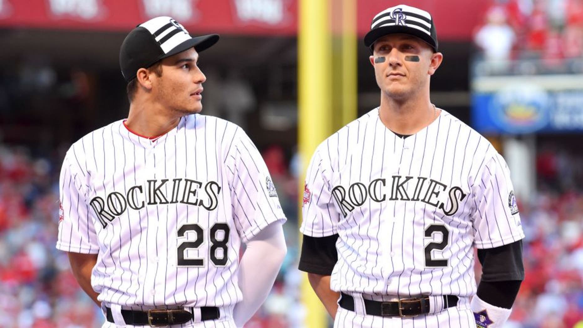 CINCINNATI, OH - JULY 14: National League All-Stars Nolan Arenado #28 and Troy Tulowitzki #2 of the Colorado Rockies look on prior to the 86th MLB All-Star Game at Great American Ball Park on July 14, 2015 in Cincinnati, Ohio. The American League defeated the National League 6-3. (Photo by Mark Cunningham/MLB Photos via Getty Images)
