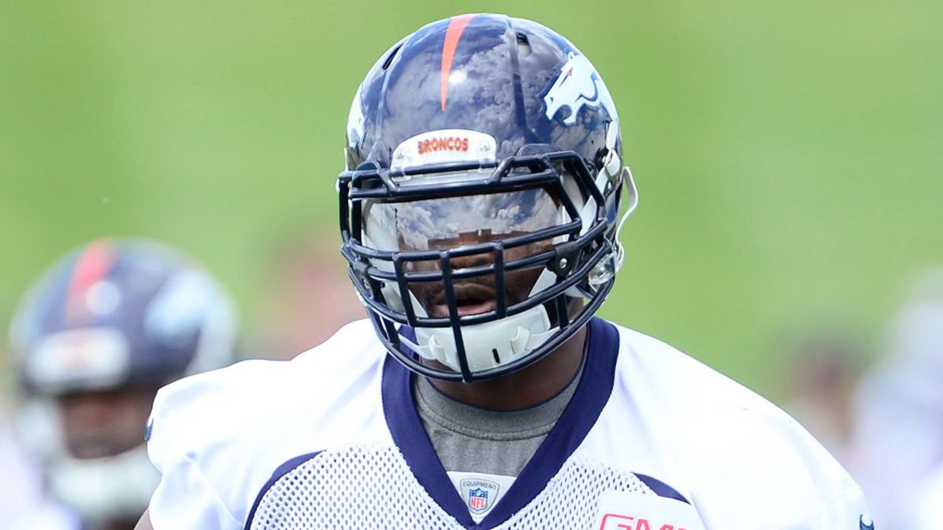 May 27, 2015; Englewood, CO, USA; Denver Broncos defensive end Kenny Anunike (91) during organized team activities at the Broncos training facility. Mandatory Credit: Ron Chenoy-USA TODAY Sports