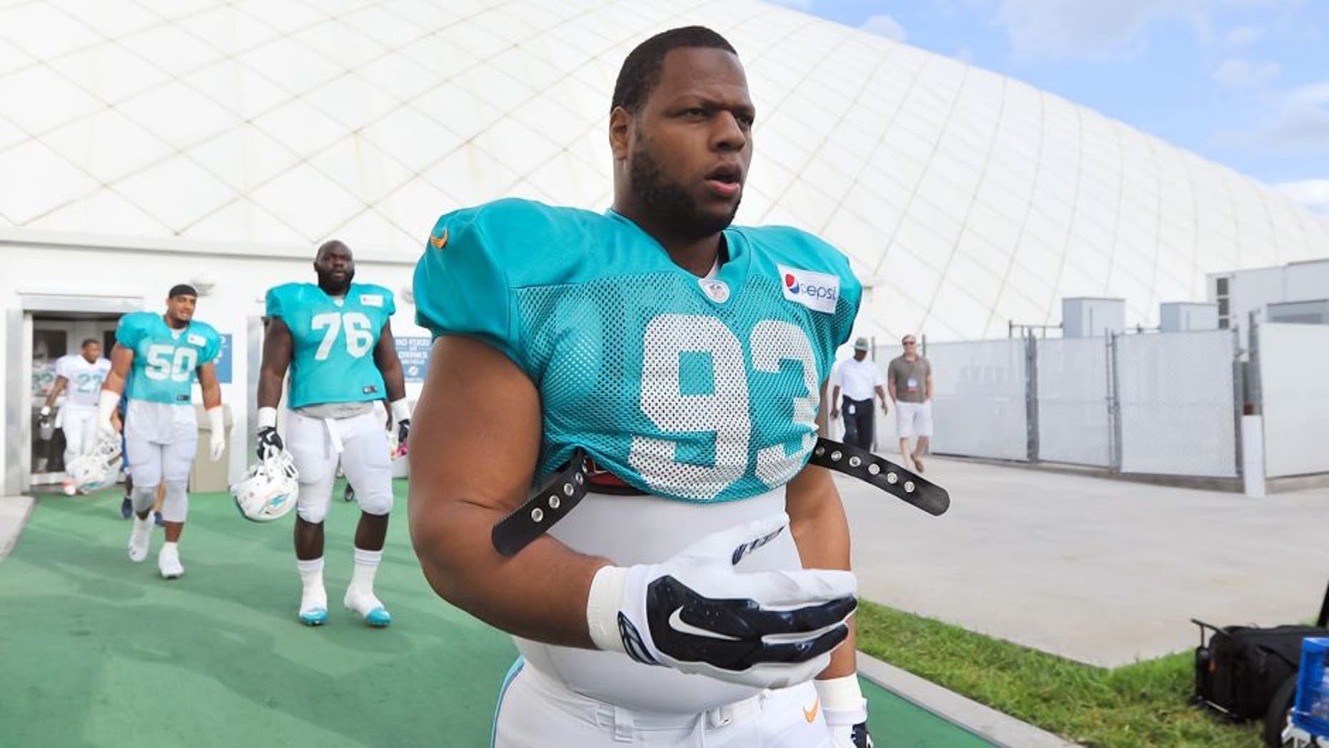 Aug 11, 2015; Davie, FL, USA; Miami Dolphins defense tackle Ndamukong Suh (93) during training camp at Doctors Hospital Training Facility. Mandatory Credit: Steve Mitchell-USA TODAY Sports