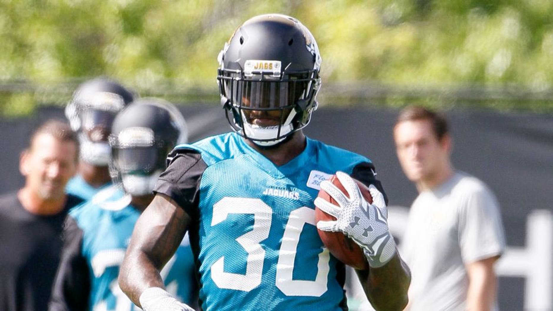 JACKSONVILLE, FL - MAY 27: Runningback Bernard Pierce #30 of the Jacksonville Jaguars during his team OTA's at Everbank Field Stadium at the Florida Blue Health and Wellness Practice Fields on May 27, 2015 in Jacksonville, Florida. (Photo by Don Juan Moore/Getty Images)
