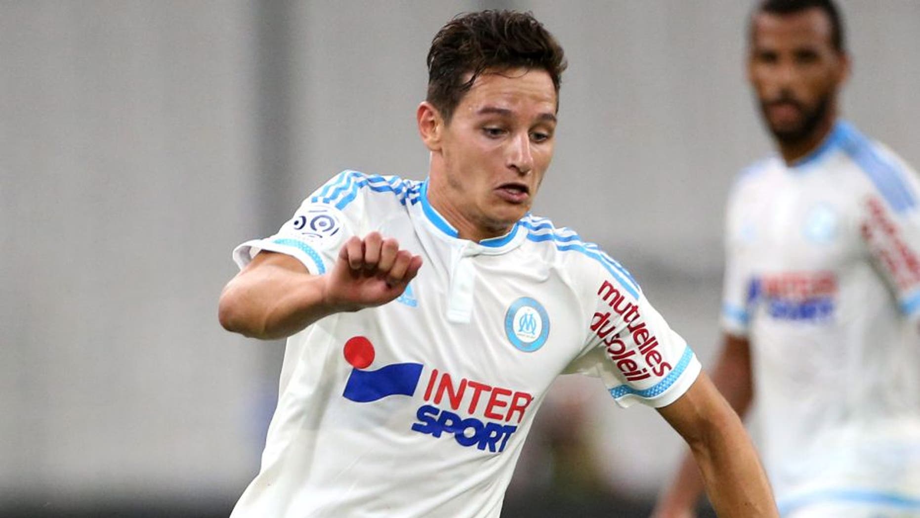 MARSEILLE - AUGUST 8: Florian Thauvin of OM in action during the French Ligue 1 match between Olympique de Marseille (OM) and SM Caen at Stade Velodrome on August 8, 2015 in Marseille, France. (Photo by Jean Catuffe/Getty Images)