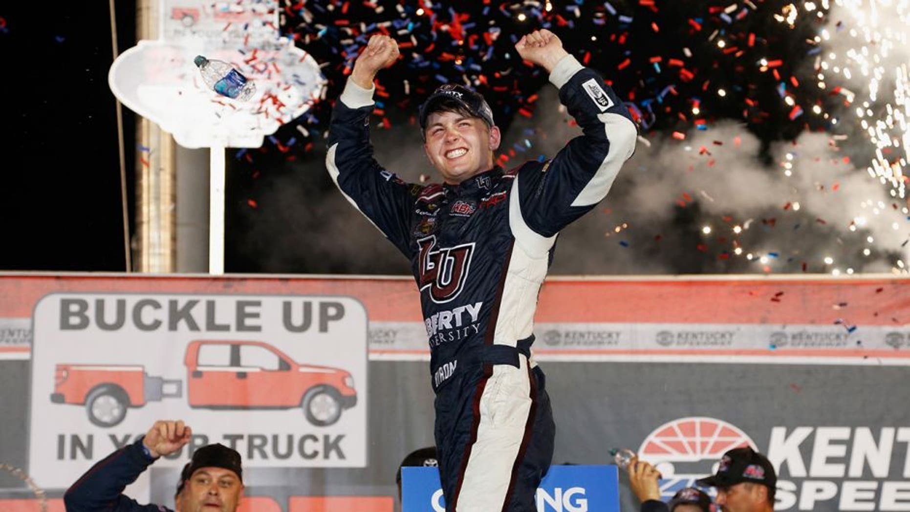 SPARTA, KY - JULY 07: William Byron, driver of the #9 Liberty University Toyota, celebrates in Victory Lane after winning the NASCAR Camping World Truck Series Buckle Up In Your Truck 225 at Kentucky Speedway on July 7, 2016 in Sparta, Kentucky. (Photo by Brian Lawdermilk/NASCAR via Getty Images)