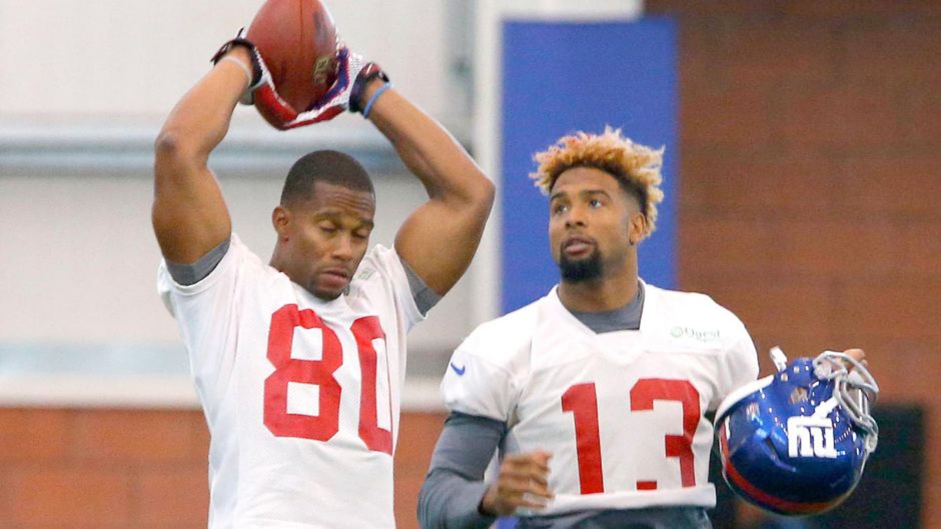 Jun 8, 2015; East Rutherford, NJ, USA; New York Giants wide receiver Victor Cruz (80) and New York Giants wide receiver Odell Beckham (13) during organized team activities at Quest Diagnostics Training Center. Mandatory Credit: Noah K. Murray-USA TODAY
