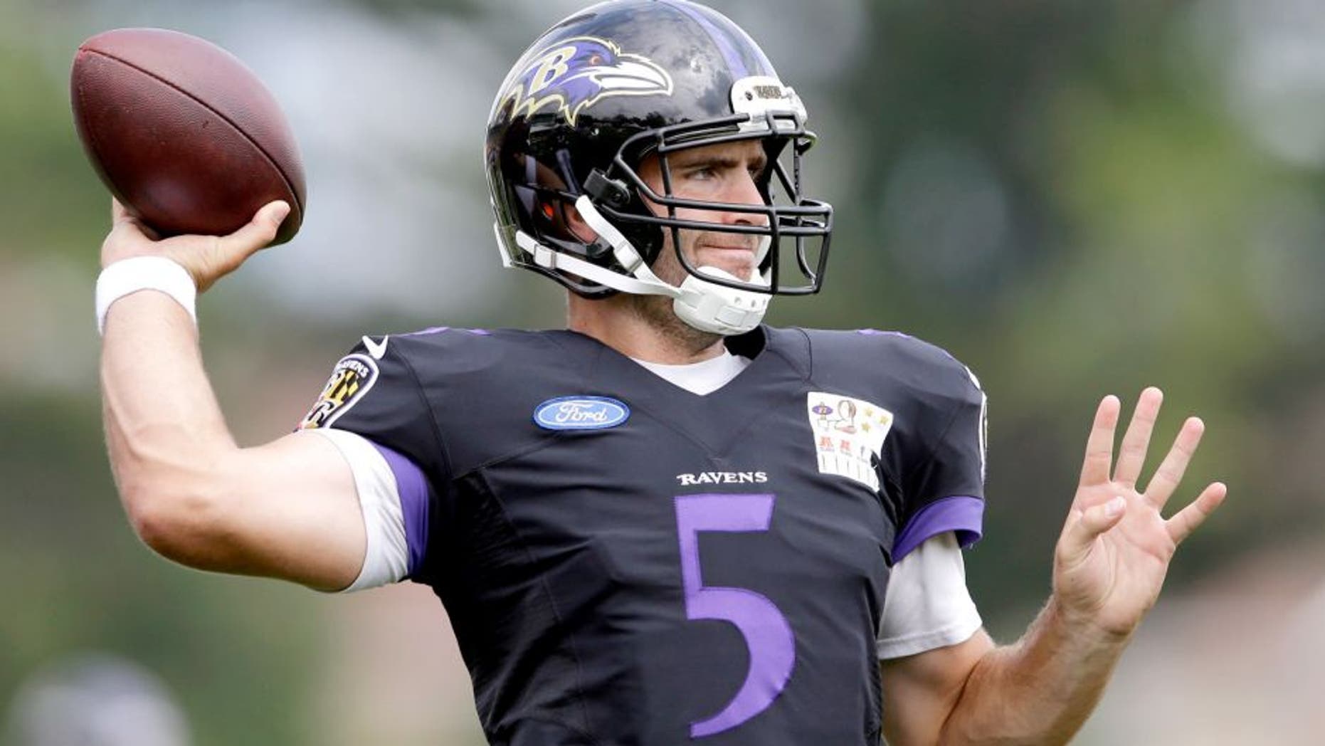 Baltimore Ravens quarterback Joe Flacco throws a pass during a joint practice with the Philadelphia Eagles at the Eagle's NFL football training camp, Wednesday, Aug. 19, 2015, in Philadelphia. (AP Photo/Matt Rourke)
