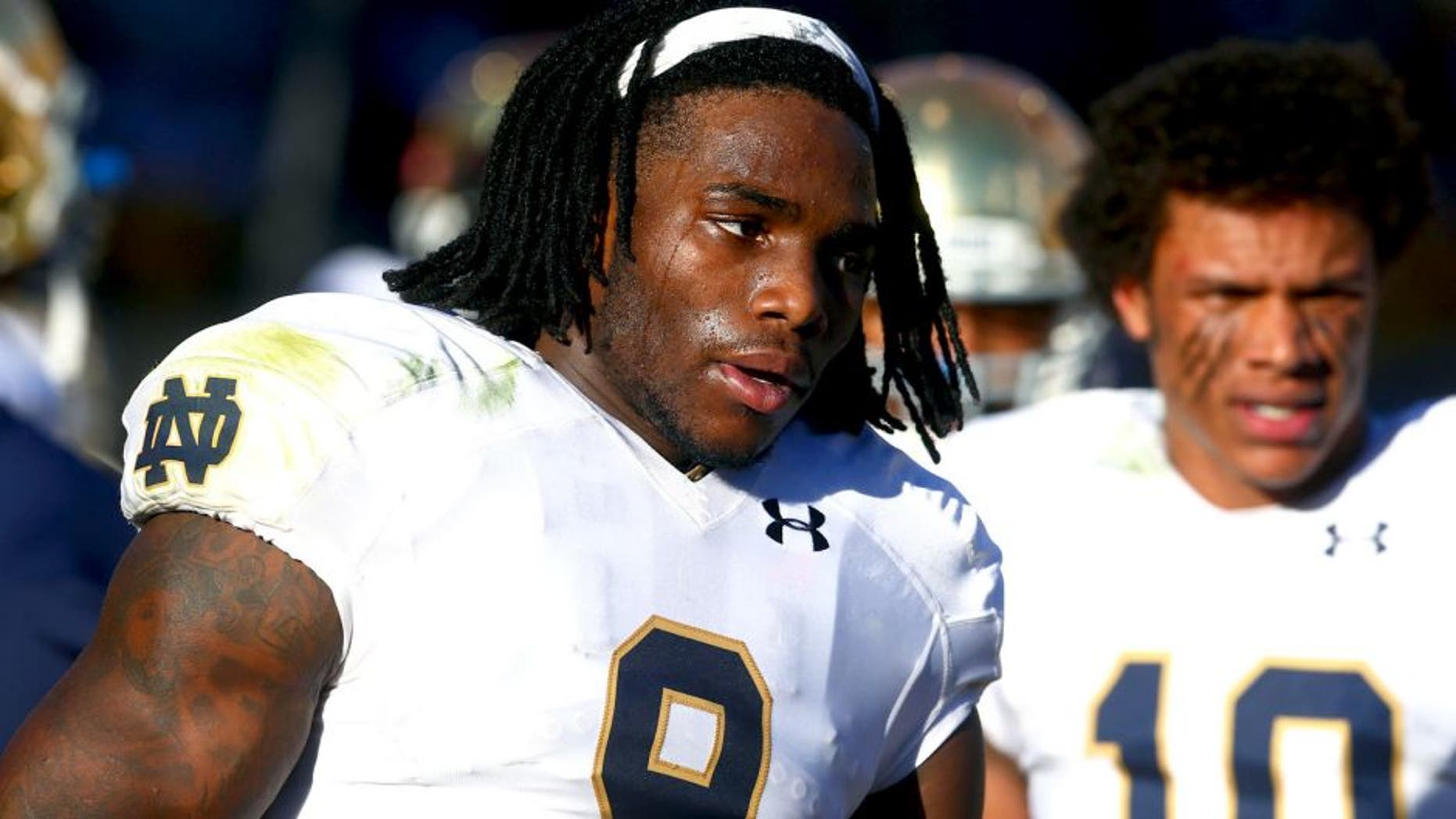 Nov 8, 2014; Tempe, AZ, USA; Notre Dame Fighting Irish linebacker Jaylon Smith (9) and safety Max Redfield (10) against the Arizona State Sun Devils at Sun Devil Stadium. Arizona State defeated Notre Dame 55-31. Mandatory Credit: Mark J. Rebilas-USA TODAY Sports