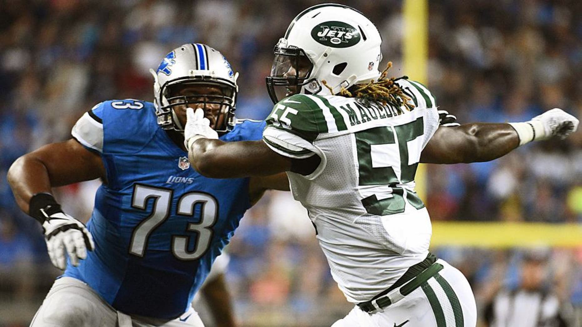 Aug 13, 2015; Detroit, MI, USA; New York Jets outside linebacker Lorenzo Mauldin (55) gets past Detroit Lions tackle Michael Williams (73) during the second quarter in a preseason NFL football game at Ford Field. Mandatory Credit: Tim Fuller-USA TODAY Sports