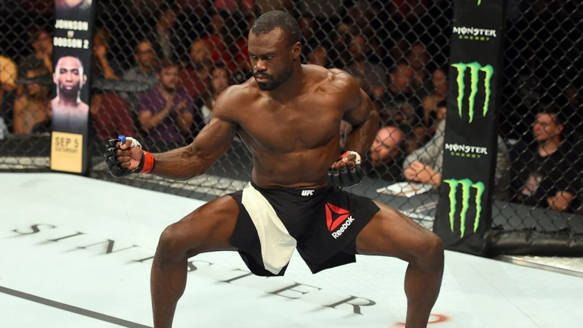 NASHVILLE, TN - AUGUST 08: Uriah Hall of Jamaica celebrates after finishing Oluwale Bamgbose by TKO in their middleweight bout during the UFC Fight Night event at Bridgestone Arena on August 8, 2015 in Nashville, Tennessee. (Photo by Josh Hedges/Zuffa LLC/Zuffa LLC via Getty Images)