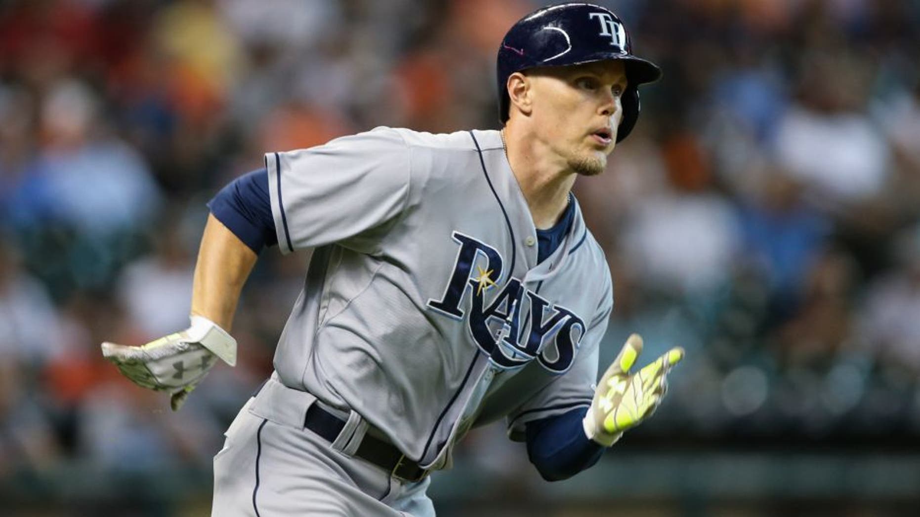Aug 19, 2015; Houston, TX, USA; Tampa Bay Rays center fielder Brandon Guyer (5) hits a double during the first inning against the Houston Astros at Minute Maid Park. Mandatory Credit: Troy Taormina-USA TODAY Sports