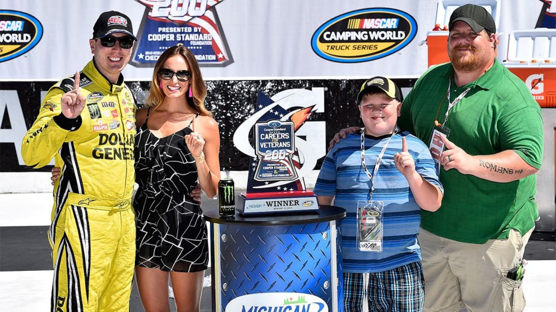 14-15 August, 2015, Brooklyn, Michigan USA Kyle Busch (51) celebrates in Victory Lane. ©2015, John Harrelson / NKP