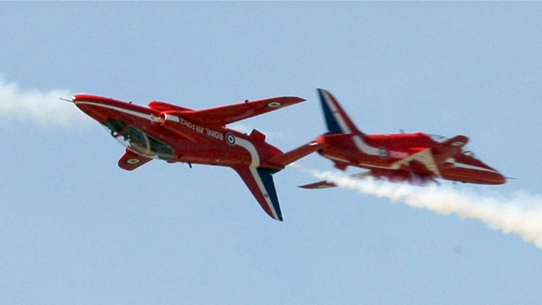 March 22, 2010: Britain's Red Arrows aerobatics squad fly over the Greek Air Force base of Kastelli, on the island of Crete, during a media presentation.
