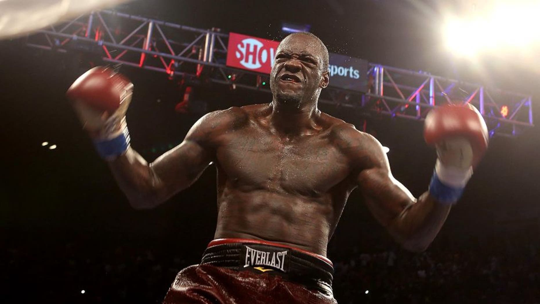 BIRMINGHAM, AL - JUNE 13: WBC World Heavyweight Champion Deontay Wilder celebrates his knockdown of Eric Molina at the Bartow Arena on June 13, 2015 in Birmingham, Alabama. (Photo by David A. Smith/Getty Images)