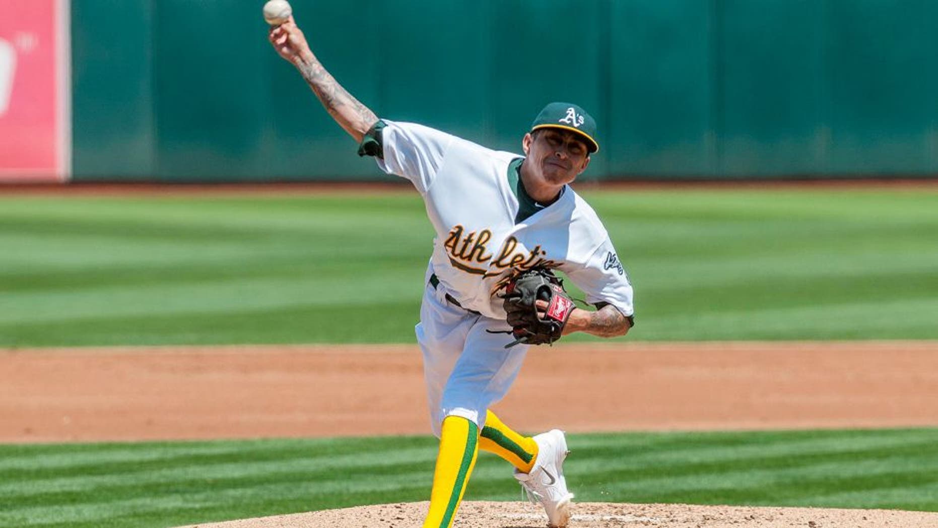 Aug 19, 2015; Oakland, CA, USA; Oakland Athletics starting pitcher Jesse Chavez (30) throws a pitch against the Los Angeles Dodgers during the second inning at O.co Coliseum. Mandatory Credit: Ed Szczepanski-USA TODAY Sports