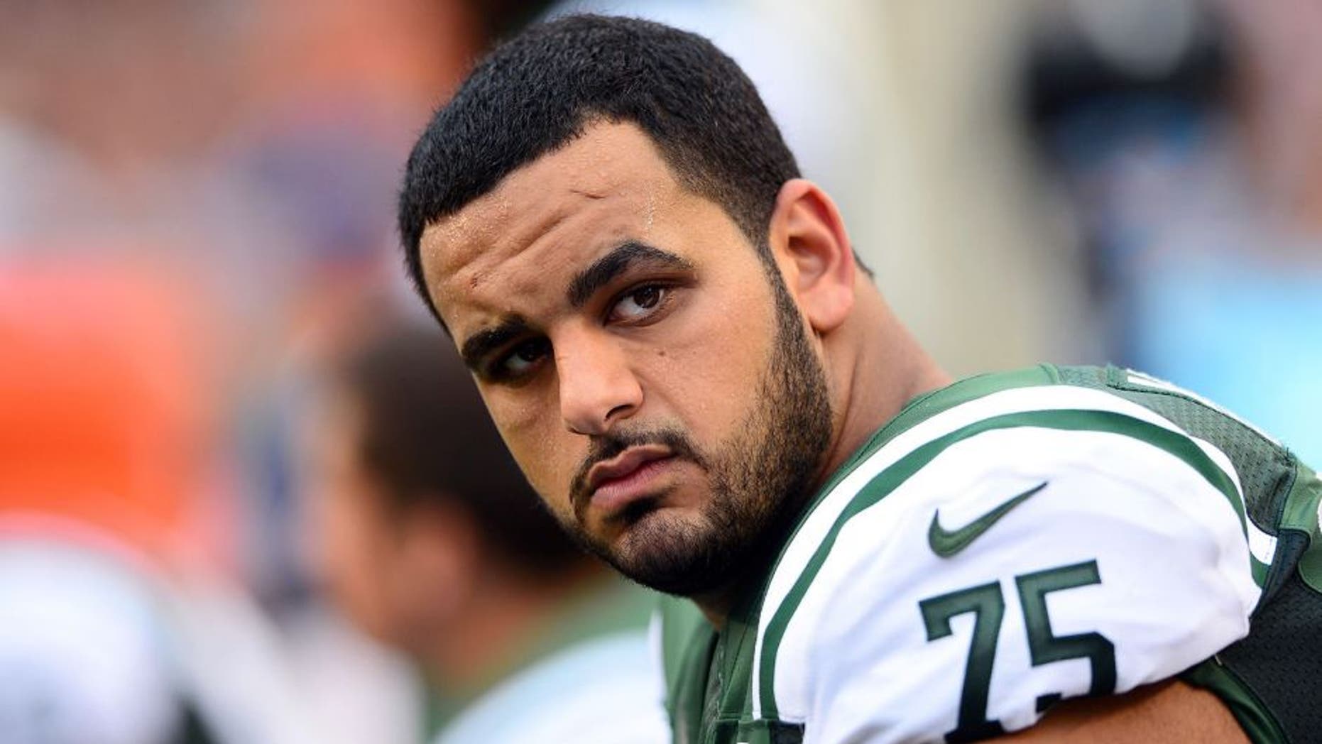 Aug 16, 2014; Cincinnati, OH, USA; New York Jets offensive tackle Oday Aboushi (75) against the Cincinnati Bengals at Paul Brown Stadium. Mandatory Credit: Andrew Weber-USA TODAY Sports