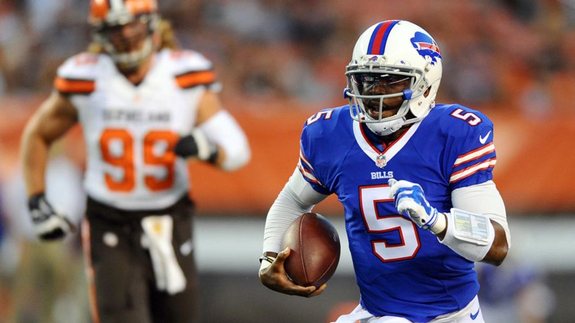 Aug 20, 2015; Cleveland, OH, USA; Buffalo Bills quarterback Tyrod Taylor (5) runs with the ball against the Cleveland Browns during the first quarter at FirstEnergy Stadium. Mandatory Credit: Ken Blaze-USA TODAY Sports