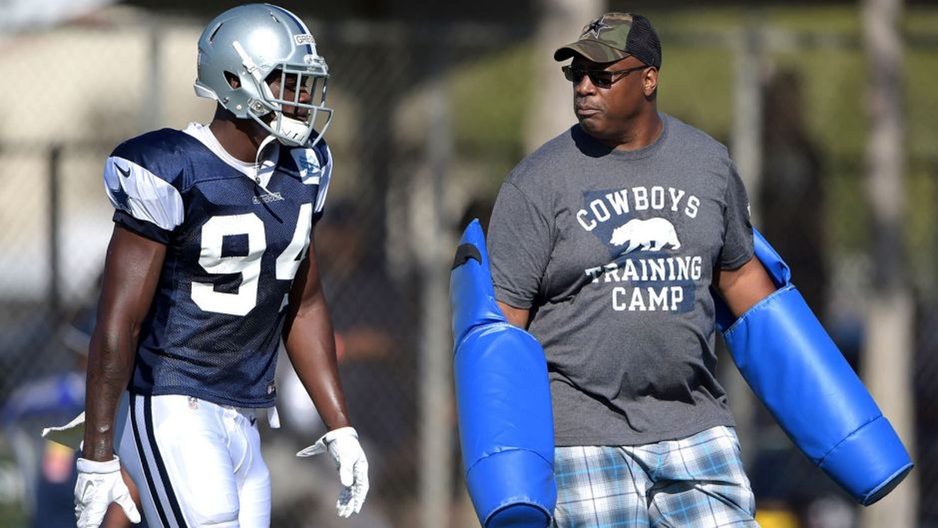 Aug 1, 2015; Oxnard, CA, USA; Dallas Cowboys defensive end Randy Gregory (94) with Cowboys former defensive end Charles Haley at training camp at River Ridge Fields. Mandatory Credit: Kirby Lee-USA TODAY Sports