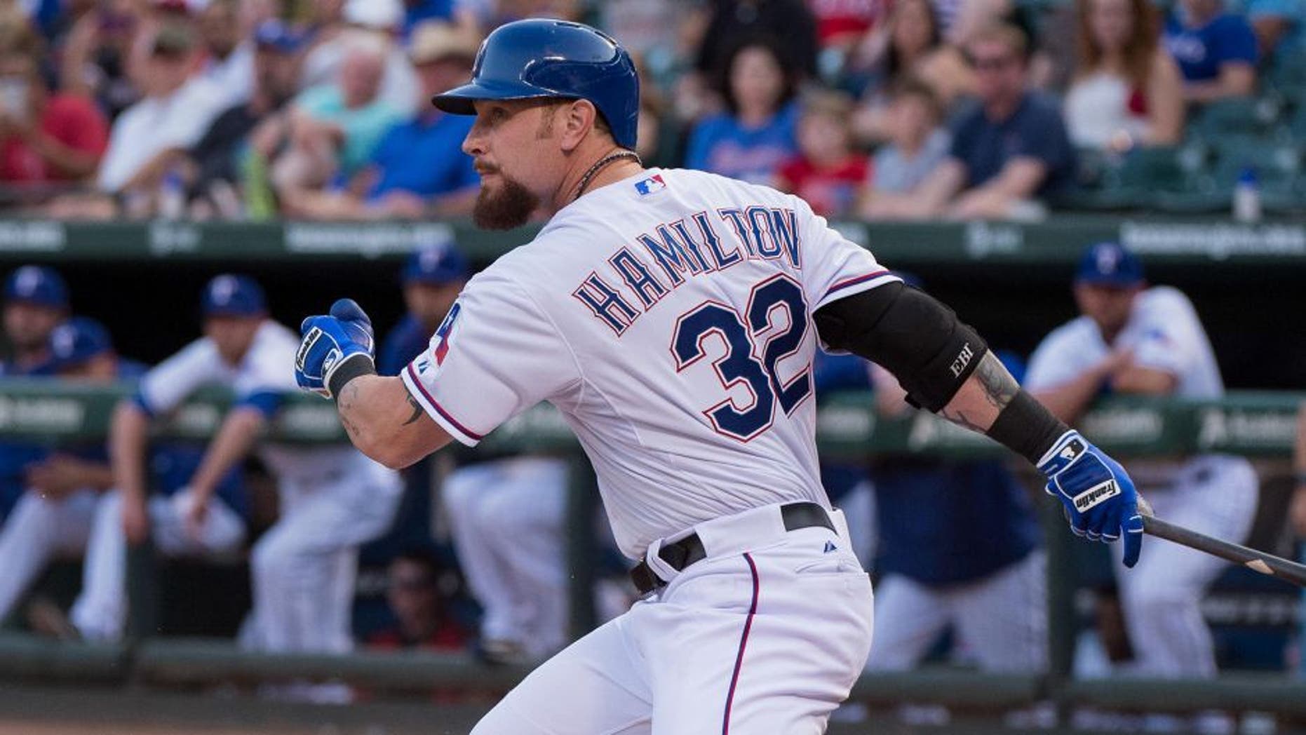 Aug 15, 2015; Arlington, TX, USA; Texas Rangers left fielder Josh Hamilton (32) bats against the Tampa Bay Rays during the game at Globe Life Park in Arlington. The Rangers defeated the Rays 12-4. Mandatory Credit: Jerome Miron-USA TODAY Sports